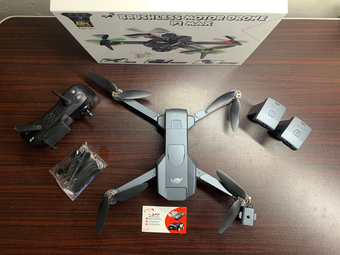 P1 MAX GPS Camera Drone With Dual Battery Triple Camera Foldable Brushless Motors Drone with 50X Zooming Obstacle Avoidance Electric Adjustable Camera Headless Mode Flow Of lights One Key Landing 360° Rotation High Quality Camera Drone With Unique Design